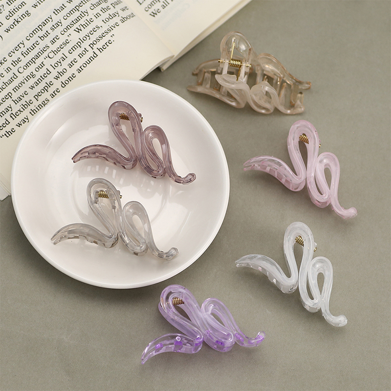 Haarklammer aus Kunststoff mit Schlangengummi-Injektion
