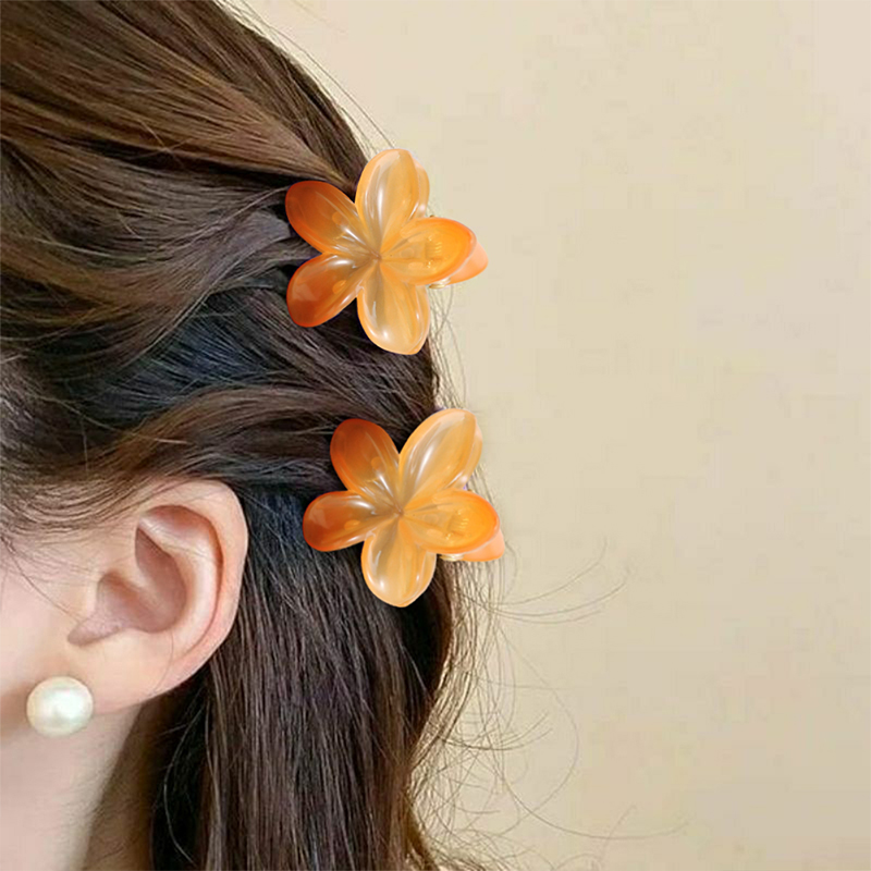 Glatte Haarklammer aus Kunststoff mit Plumeria-Marmor-Injektion